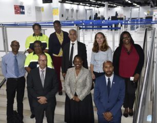 Minister-Richardson-receives-presentation-on-ICT-system-used-by-Immigration-at-the-airport.aspx_.jpg