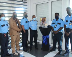 Government-Security-Dept-Staff-Sign-Condolence-Memorial-Book-for-the-late-Vivian-Philips.aspx_.jpg
