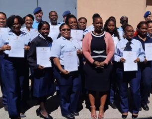 Minister-Richardson-applauds-17-Immigration-Officers-on-training-course-completion.aspx_.jpg