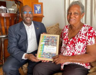 Minister-Samuel-acknowledges-the-contributions-of-Sint-Maarten-pioneers-highlighted-in.aspx_.jpg