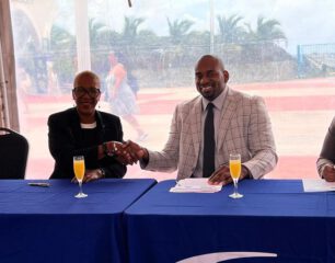 Minister-Ottley-signs-MOU-with-Royal-Caribbean-Group-on-behalf-of-Government-to-secure-up-to-1000-jobs-on-board-their-vesse.aspx_.jpg