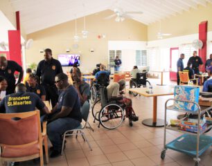 Fire fighters with residents of the Senior Citizen Home